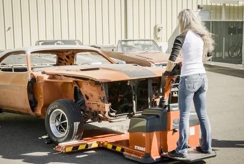 This graveyard carz' only female cast worman is confirmed to be blonde...